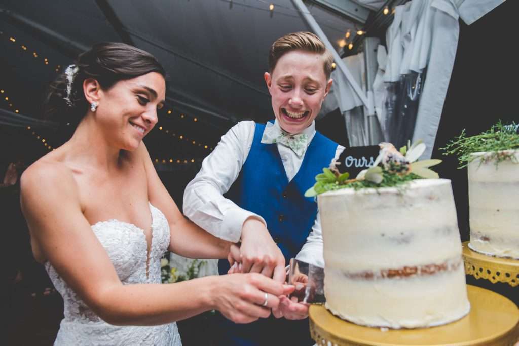 lgbtq wedding at rideland mansion cake cutting photos